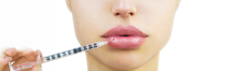 Lippenunterspitzung Koeln Spritze an Lippen